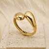Geometric, glossy cross stainless steel bangle with asymmetric droplet double-headed design in INS style. - 图片 2